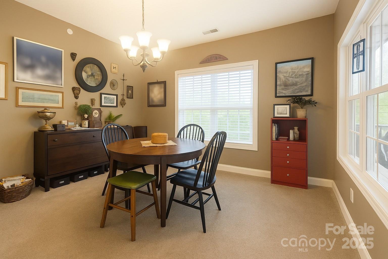 1350 21st Avenue Northeast Hickory, NC 28601 - Photo 9 of 27 a view of a dining room with furniture window and wooden floor