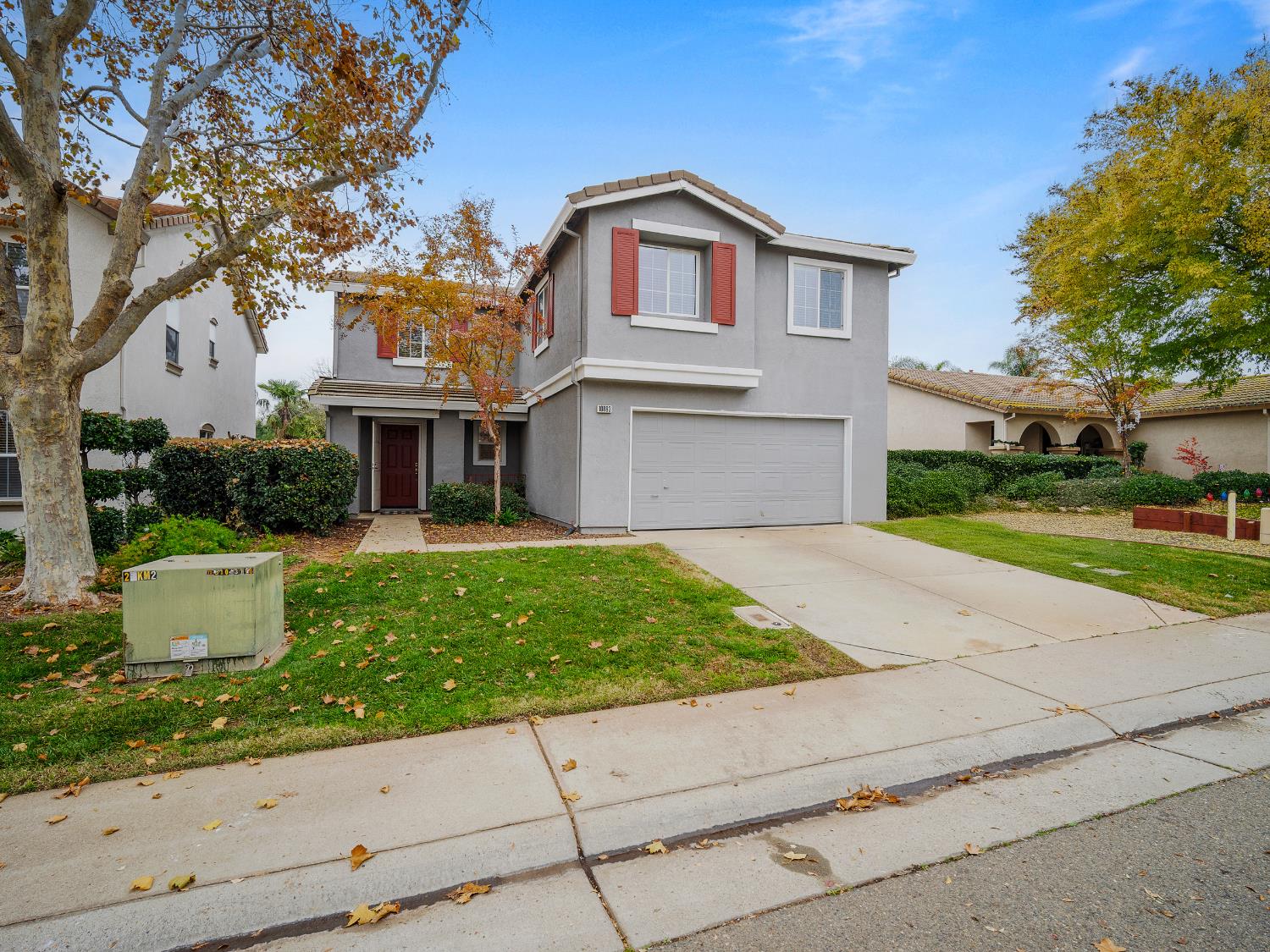 10893 Woolwich Way Mather, CA 95655 - Photo 1 of 24 a front view of a house with a yard and potted plants