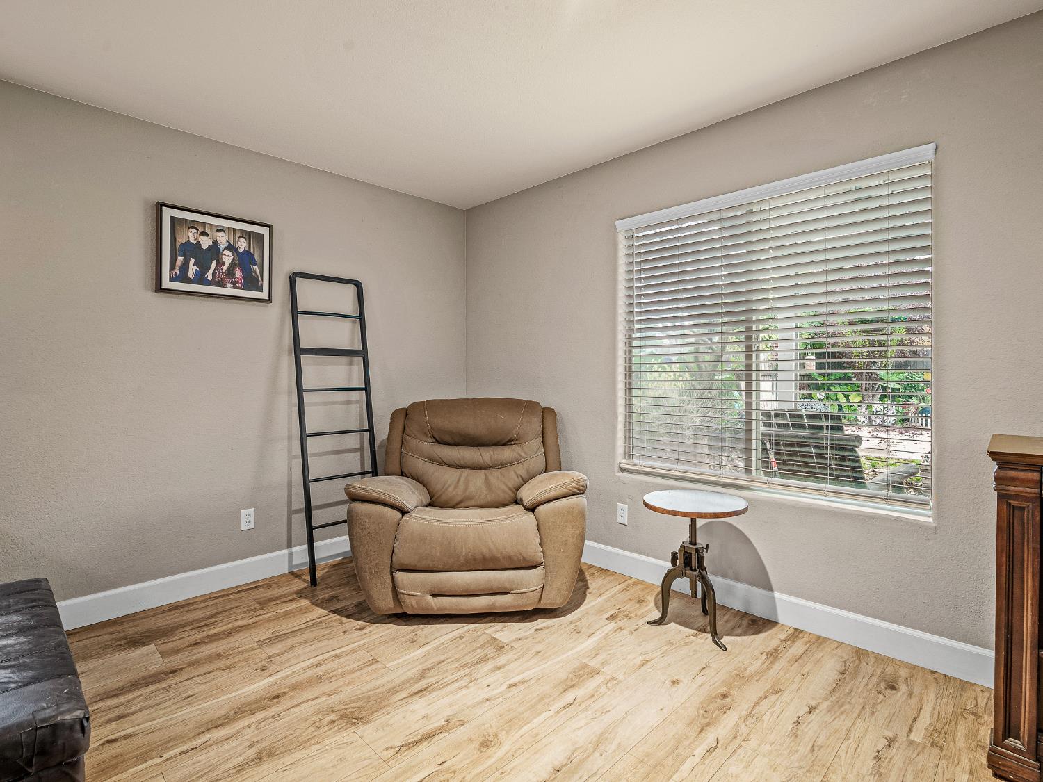 10893 Woolwich Way Mather, CA 95655 - Photo 8 of 24 a living room with furniture and a window