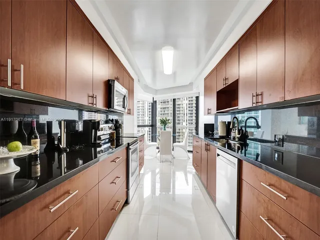 a bedroom with bed and a couch