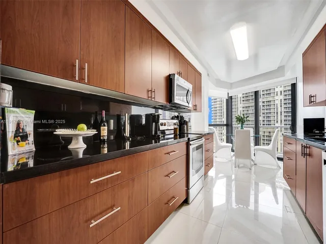 a bathroom with a toilet and a tub