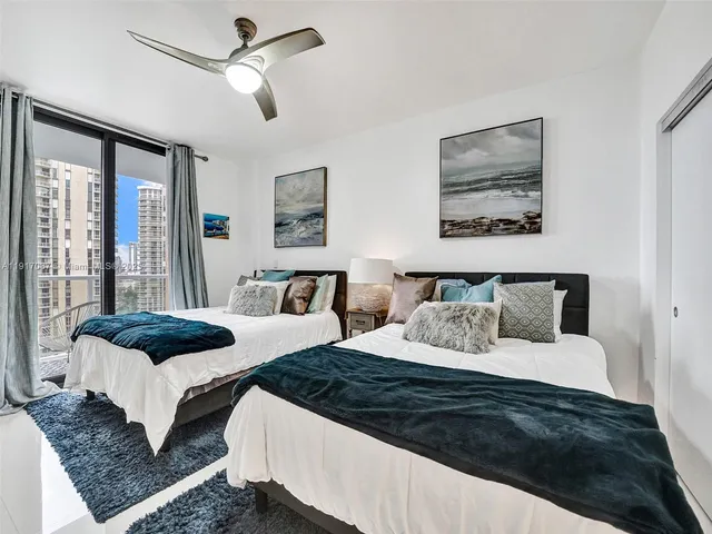 a view of a city with tall buildings