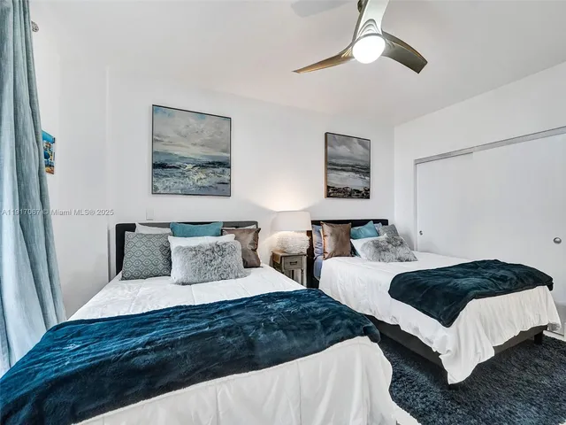 a view of a lake with a city