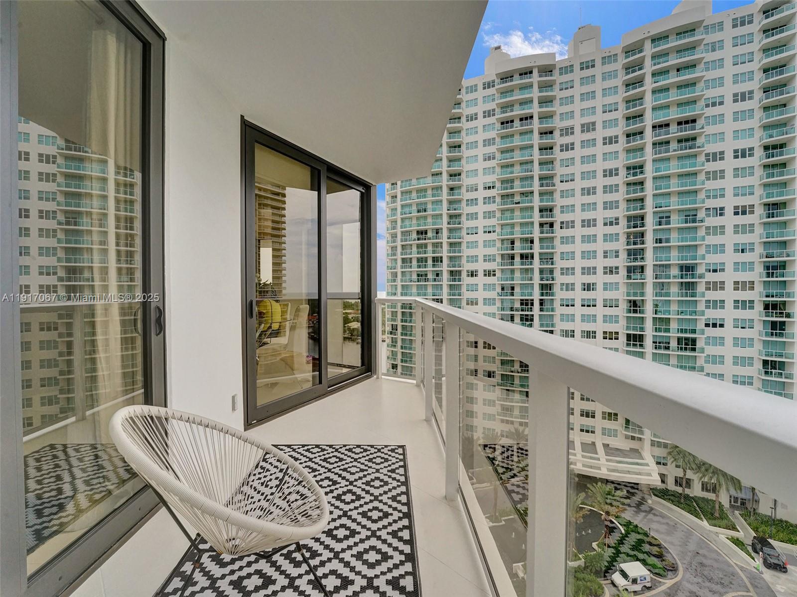 20281 East Country Club Drive, Unit 1114 Aventura, FL 33180 - Photo 56 of 87 a view of balcony with wooden floor