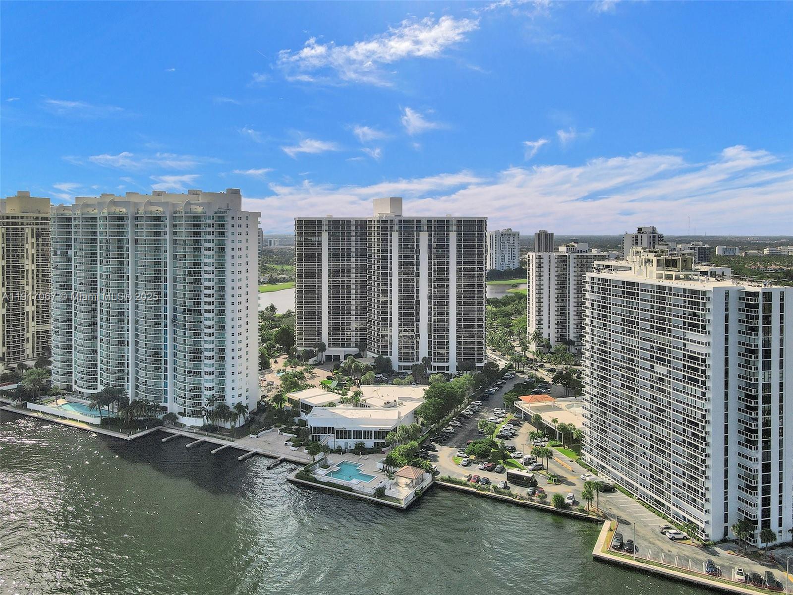 20281 East Country Club Drive, Unit 1114 Aventura, FL 33180 - Photo 69 of 87 a car parked in front of a building