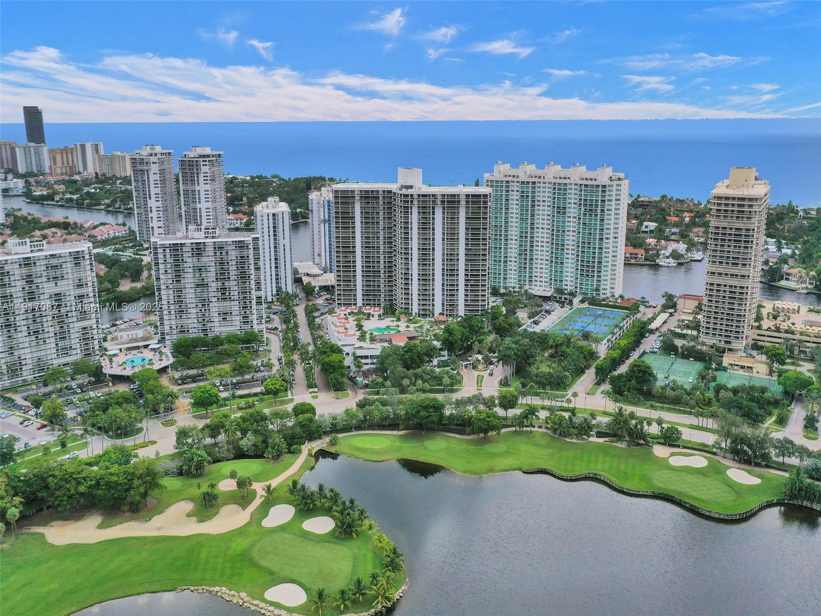 20281 East Country Club Drive, Unit 1114 Aventura, FL 33180 - Photo 81 of 87 a view of a city with tall buildings