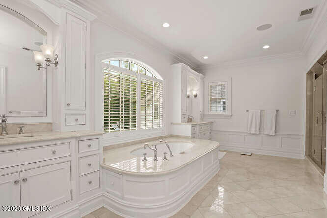 33 Boulder Brook Road Greenwich, CT 06830 - Photo 24 of 50 a bathroom with a bathtub and a sink