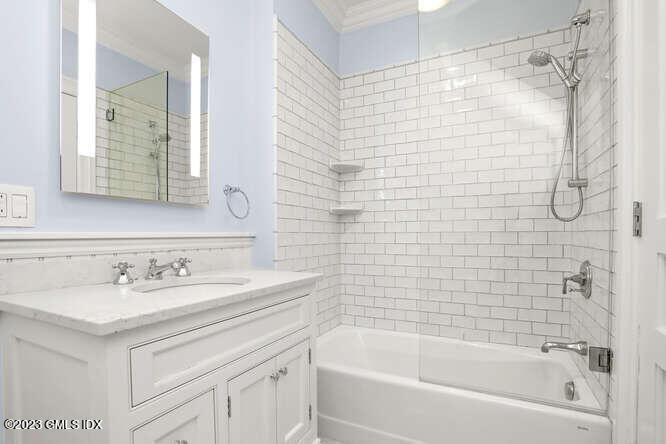 33 Boulder Brook Road Greenwich, CT 06830 - Photo 29 of 50 a bathroom with a sink and a bathtub