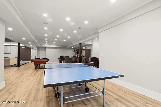 33 Boulder Brook Road Greenwich, CT 06830 - Photo 41 of 50 a dining room with furniture and wooden floor