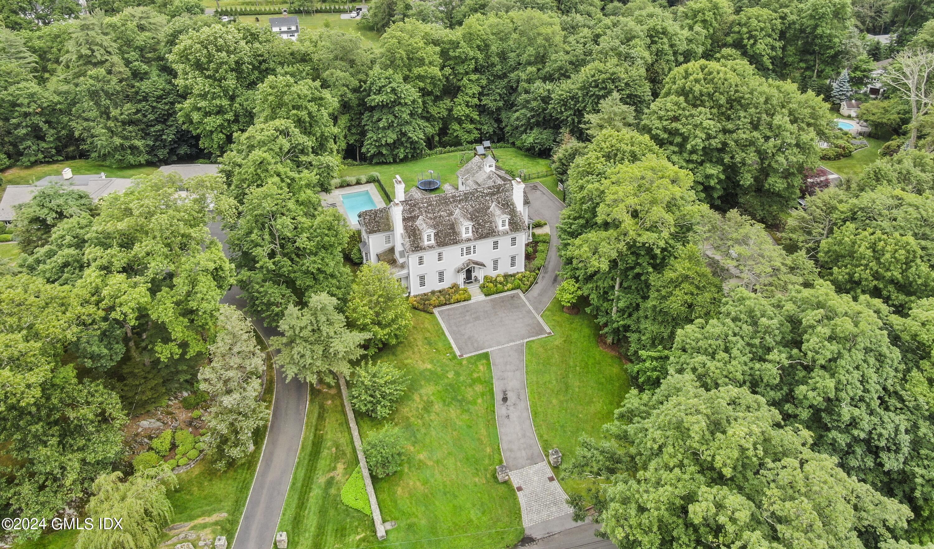 33 Boulder Brook Road Greenwich, CT 06830 - Photo 46 of 50 an aerial view of residential house with outdoor space and trees all around