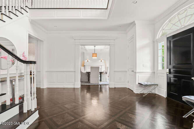33 Boulder Brook Road Greenwich, CT 06830 - Photo 5 of 50 a view of empty room with wooden floor and fan
