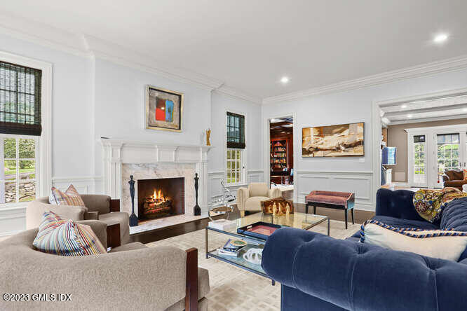 33 Boulder Brook Road Greenwich, CT 06830 - Photo 7 of 50 a living room with furniture and a fireplace