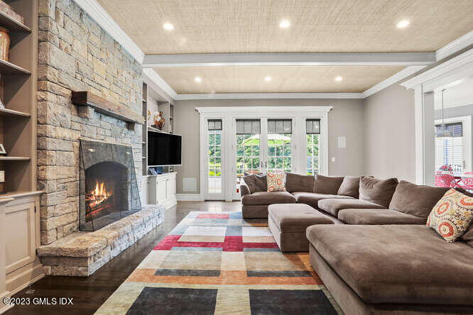 33 Boulder Brook Road Greenwich, CT 06830 - Photo 10 of 50 a living room with furniture fireplace and window