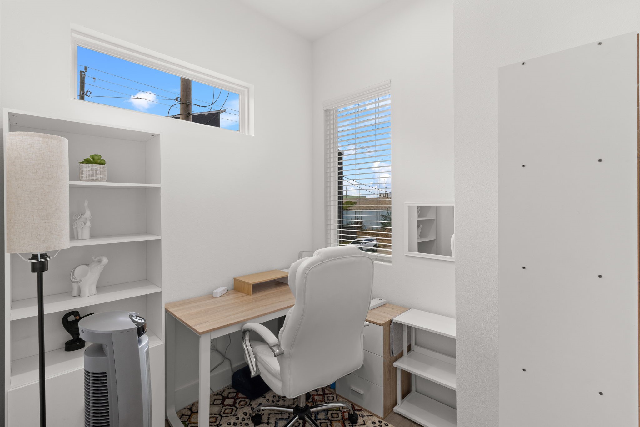 517 Schweikhardt Street Houston, TX 77020 - Photo 35 of 49 a view of a workspace with furniture and a window