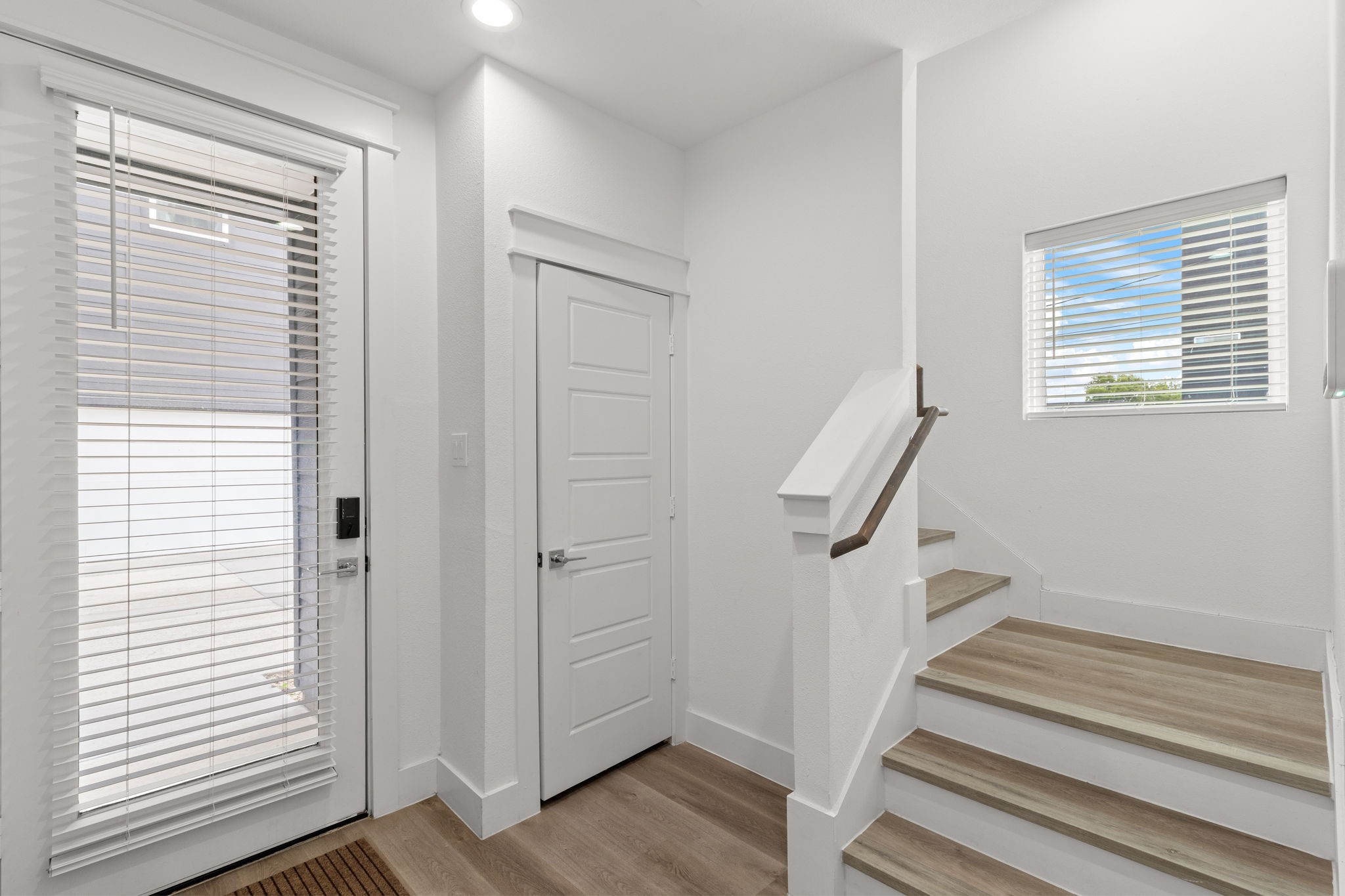517 Schweikhardt Street Houston, TX 77020 - Photo 38 of 49 a view of entryway with wooden floor and stairs