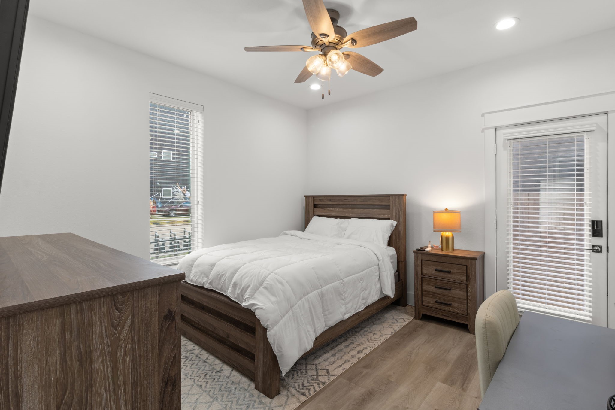 517 Schweikhardt Street Houston, TX 77020 - Photo 39 of 49 a bedroom with a bed chandelier and a window