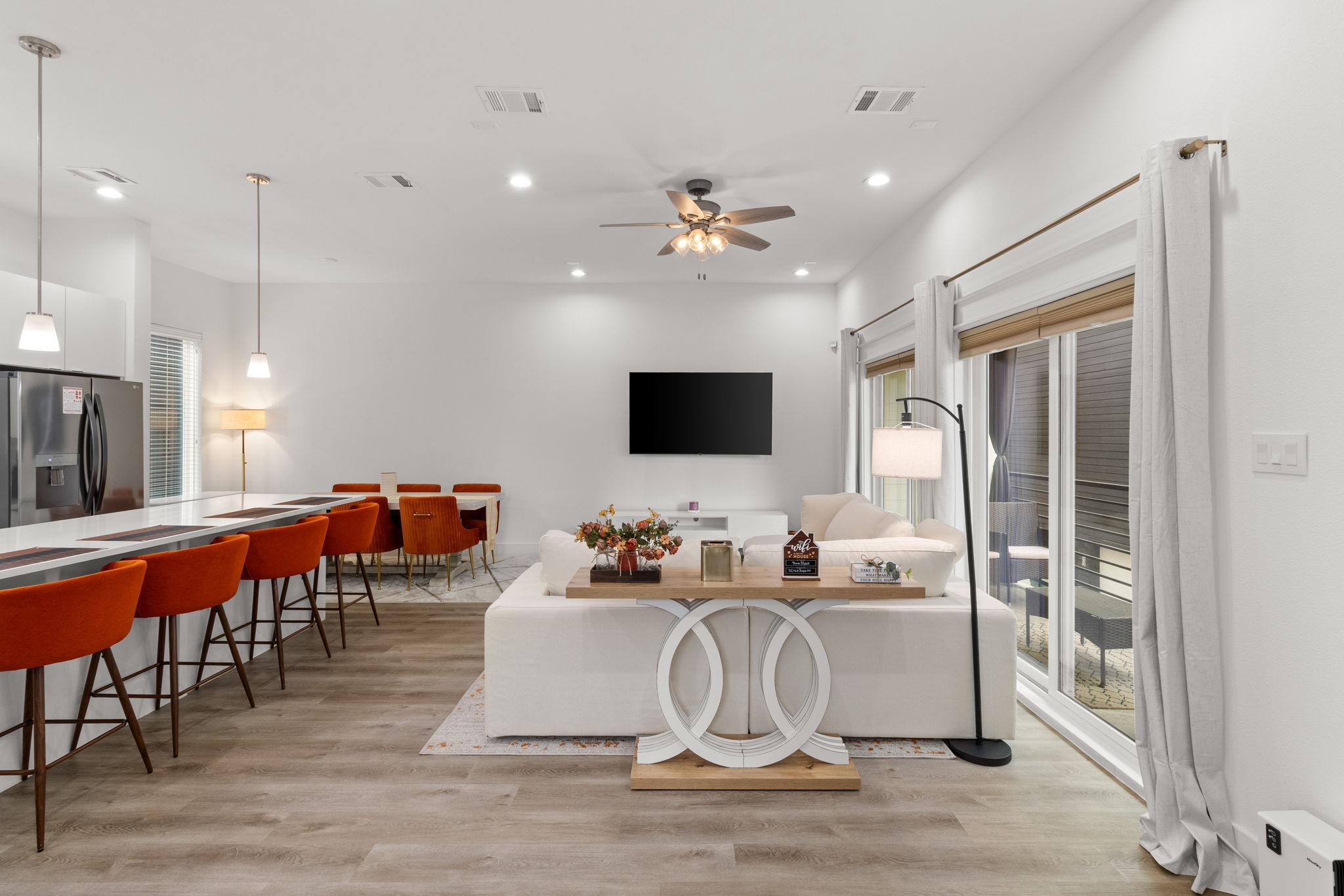 517 Schweikhardt Street Houston, TX 77020 - Photo 6 of 49 a living room with fireplace furniture and a flat screen tv