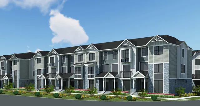 a bathroom with a tub and a window