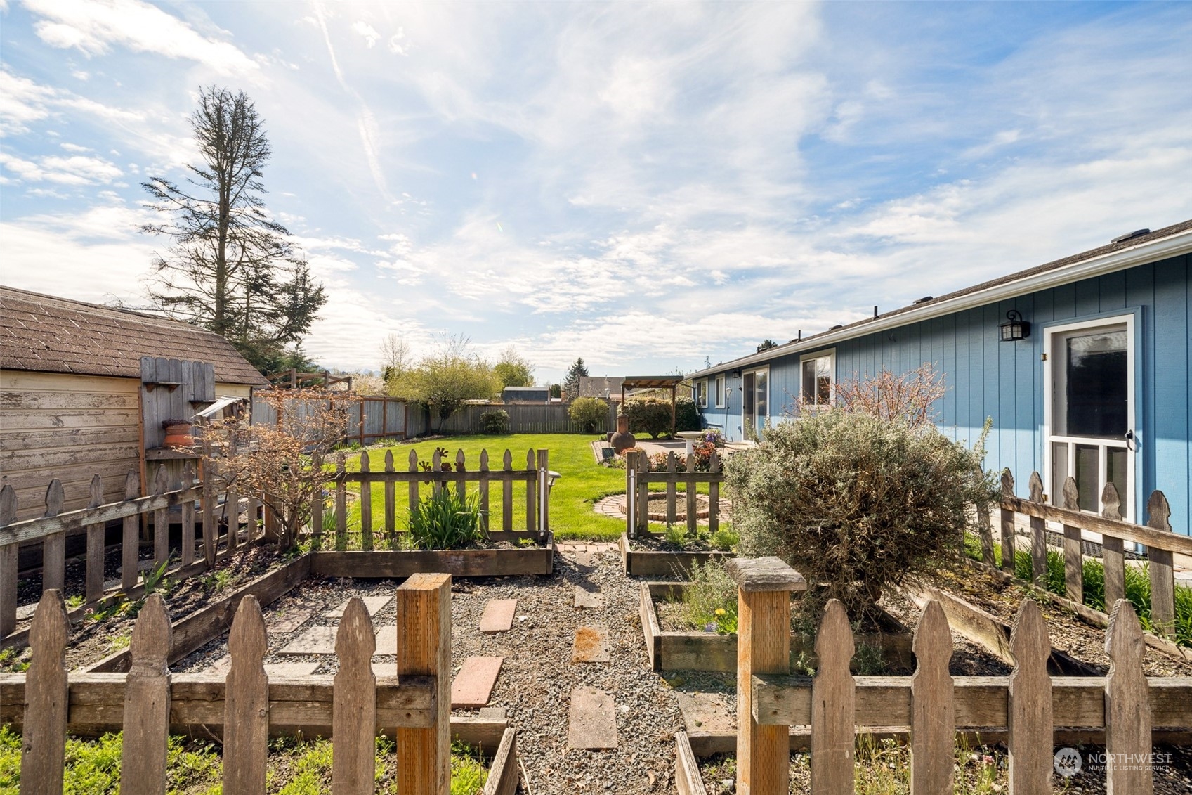 509 Harmony Lane Enumclaw, WA 98022 - Photo 19 of 22 a view of a house with a yard