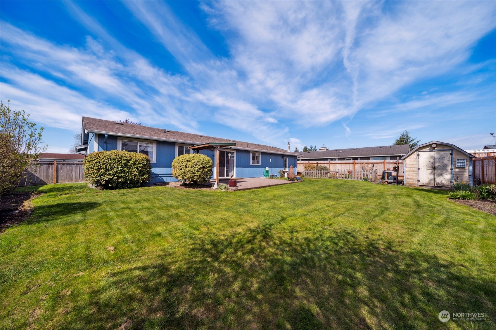 509 Harmony Lane Enumclaw, WA 98022 - Photo 21 of 22 a front view of a house with a garden