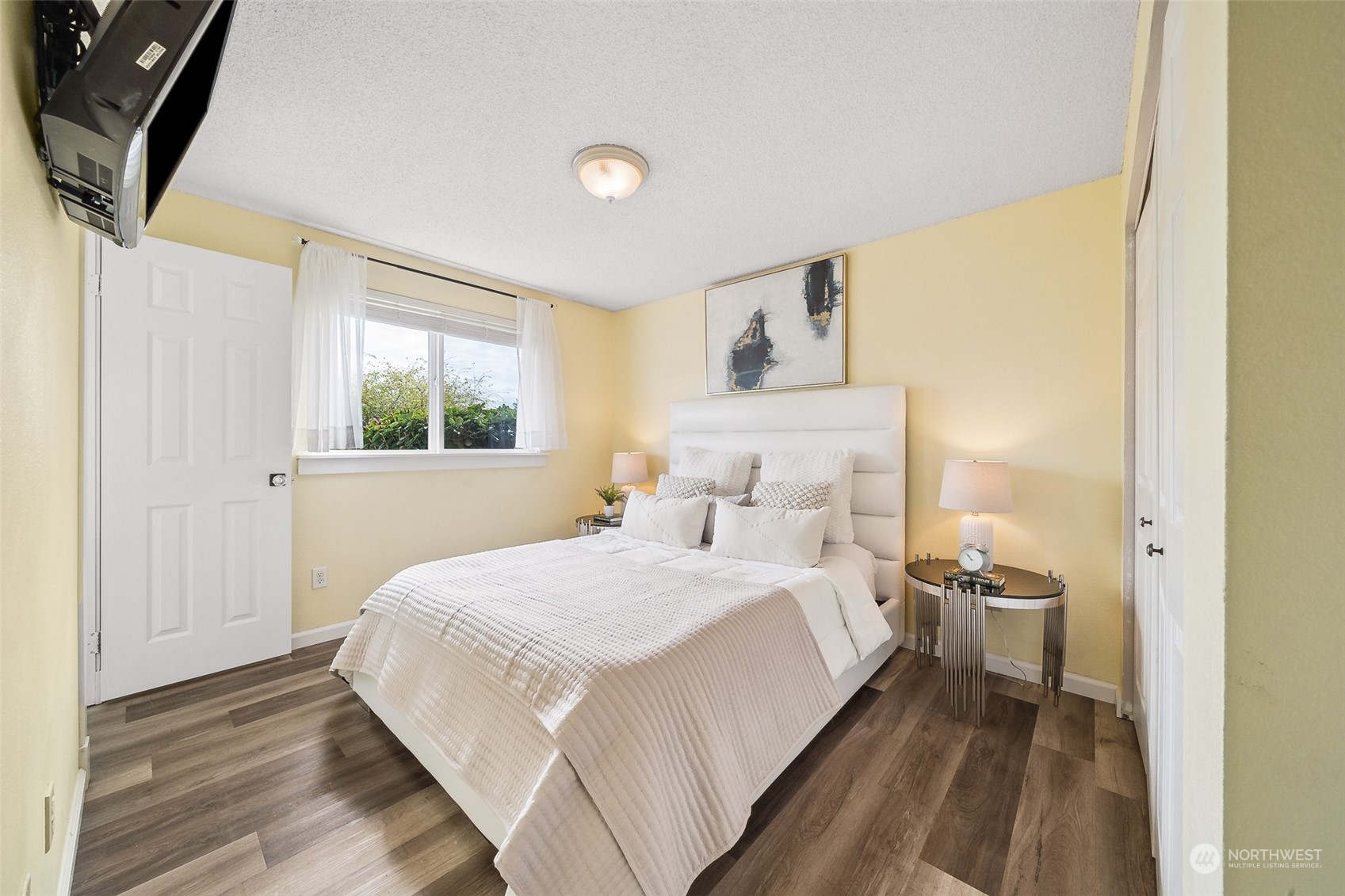 509 Harmony Lane Enumclaw, WA 98022 - Photo 8 of 22 a bedroom with a bed and a window