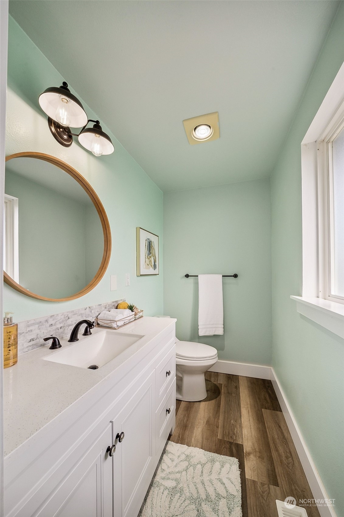 509 Harmony Lane Enumclaw, WA 98022 - Photo 10 of 22 a bathroom with a sink and a mirror