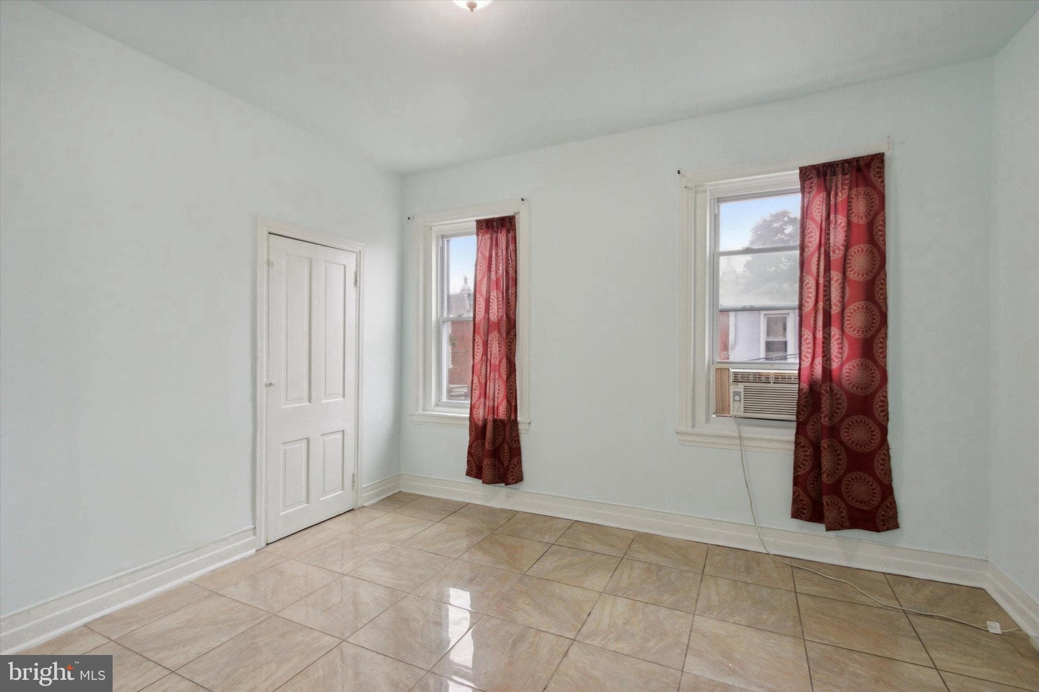 1933 Page Street Philadelphia, PA 19121 - Photo 13 of 19 a view of an empty room with window