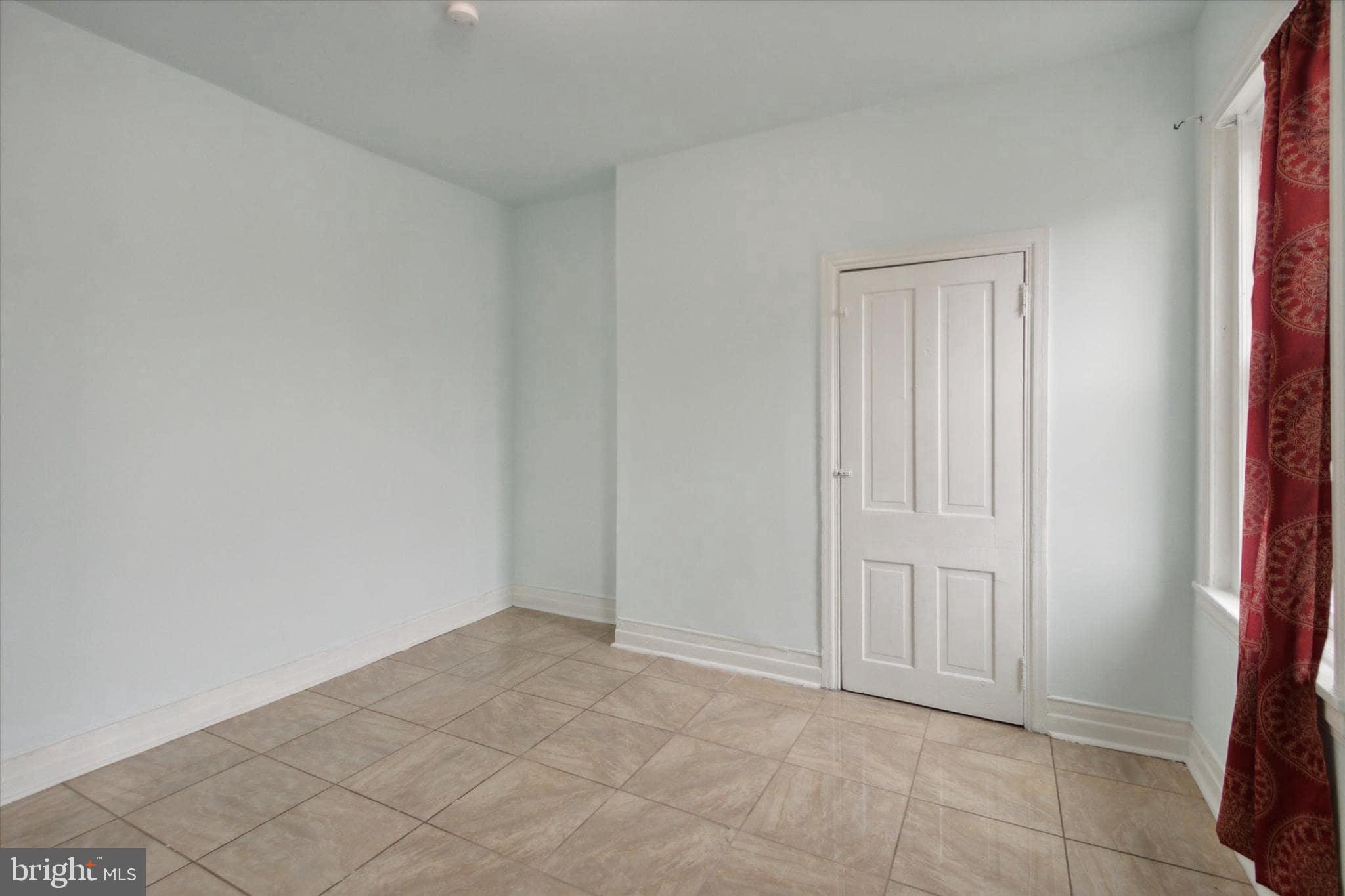 1933 Page Street Philadelphia, PA 19121 - Photo 15 of 19 an empty room with windows