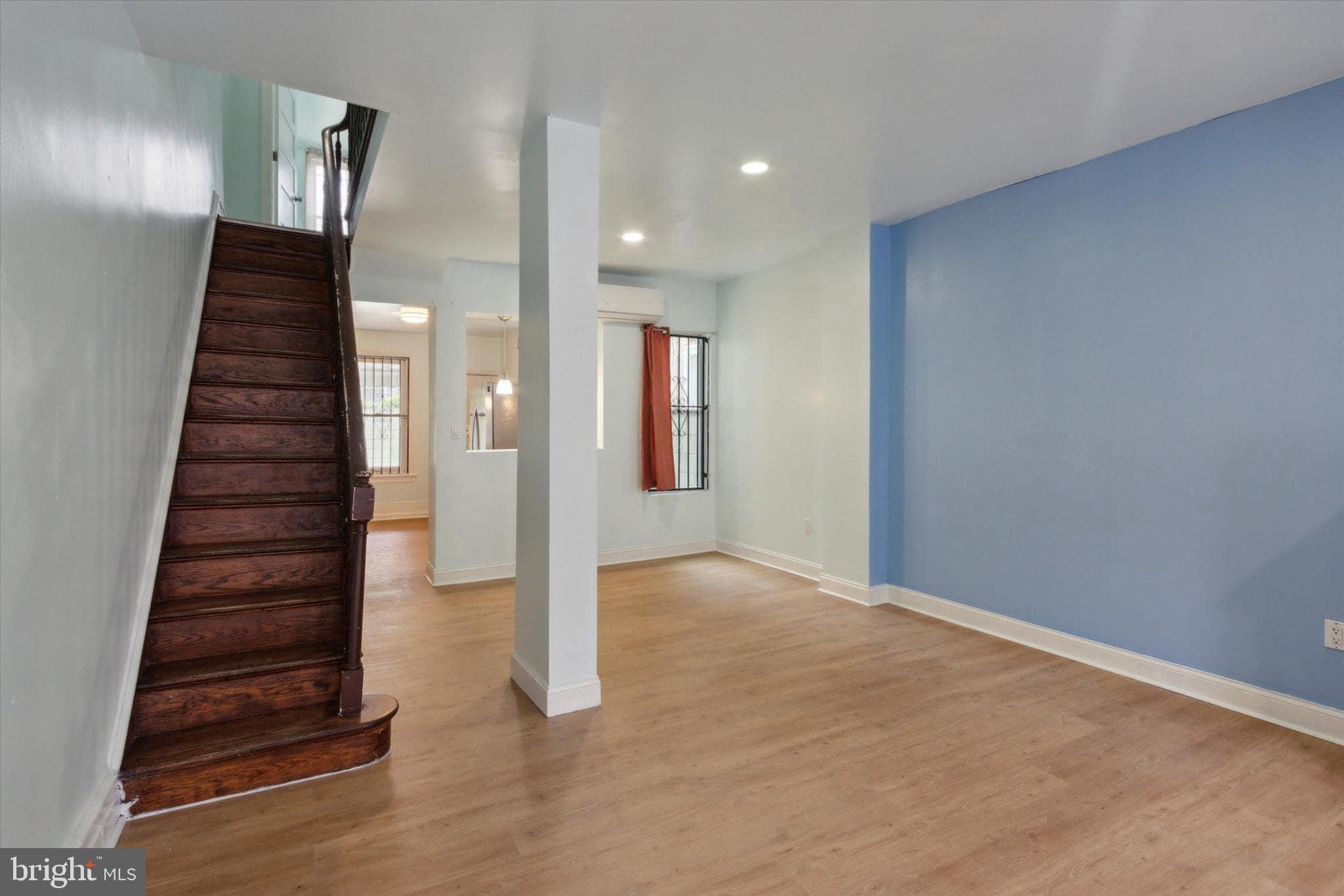 1933 Page Street Philadelphia, PA 19121 - Photo 2 of 19 a view of an entryway with wooden floor