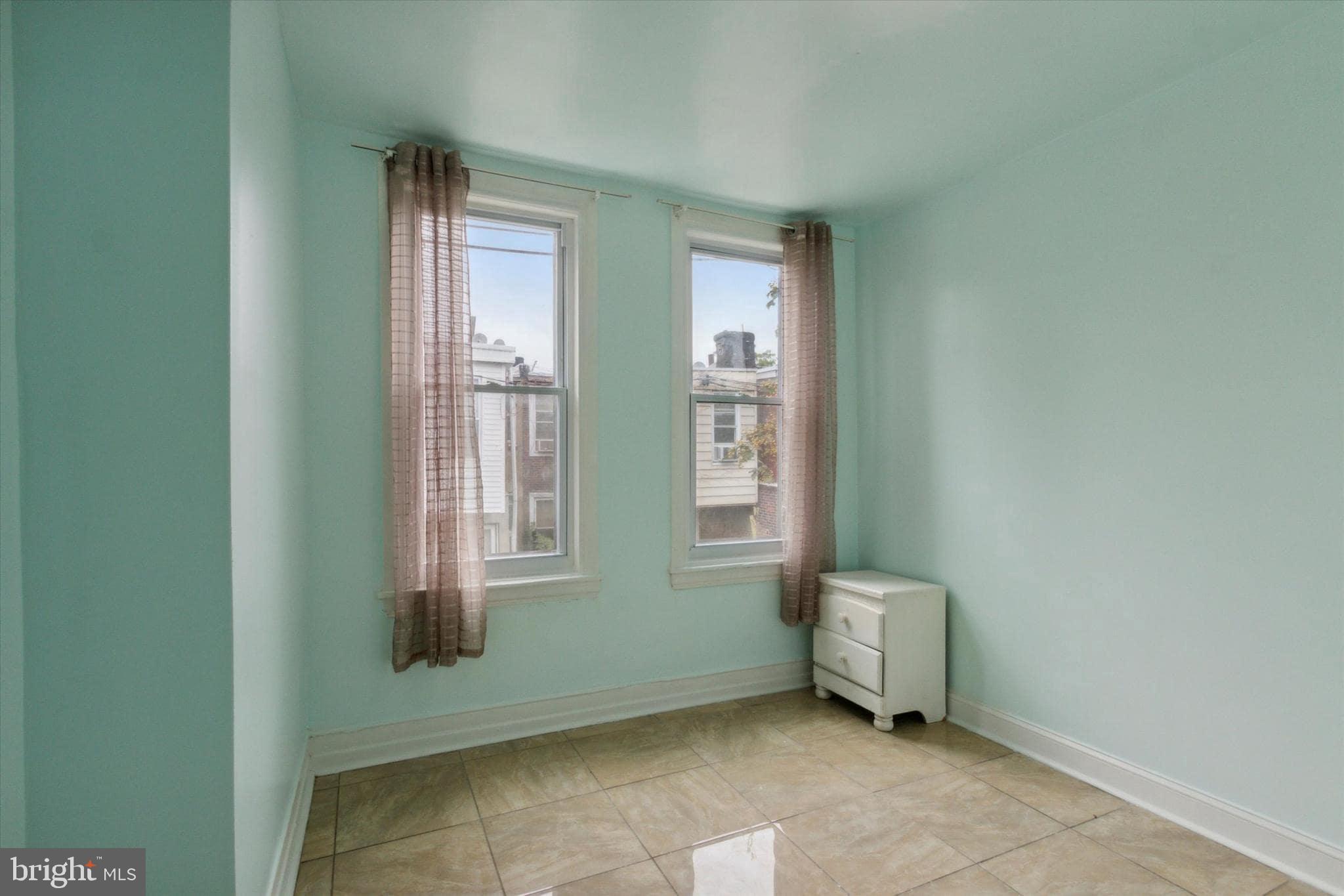 1933 Page Street Philadelphia, PA 19121 - Photo 9 of 19 a view of an empty room with a window