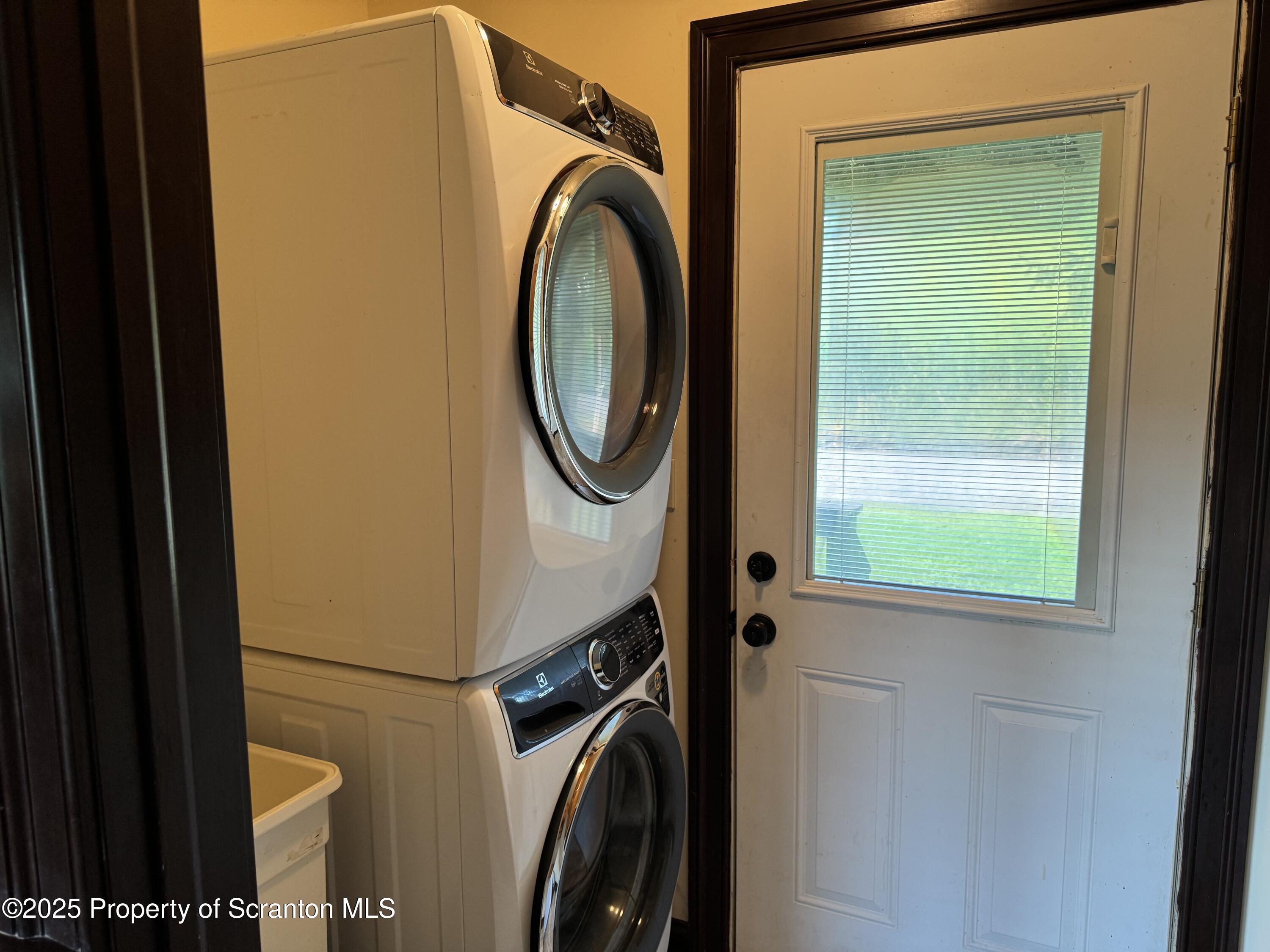131 Ball Pond Road Thompson, PA 18465 - Photo 13 of 21 a utility room with dryer and washer