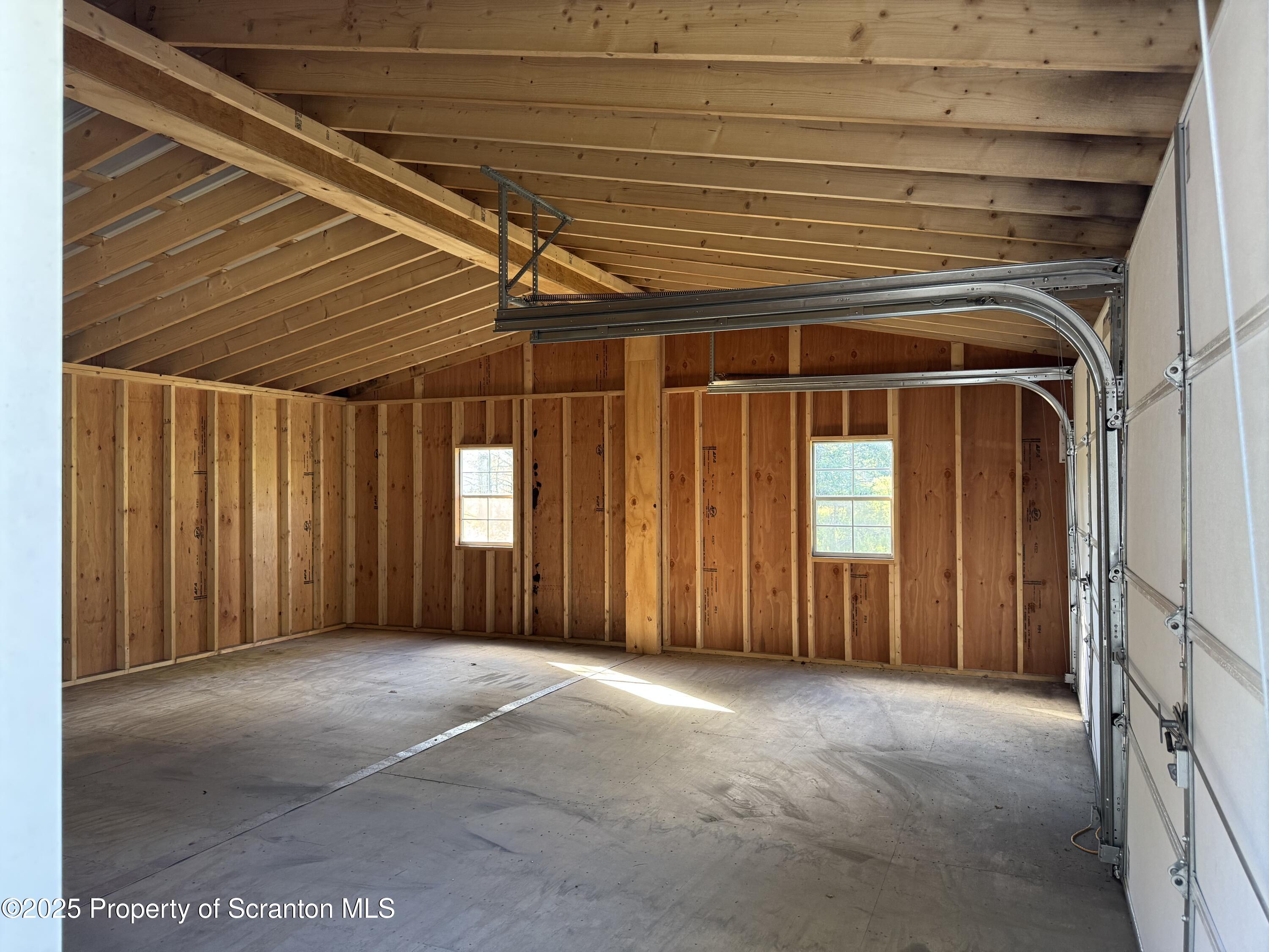 131 Ball Pond Road Thompson, PA 18465 - Photo 16 of 21 a view of a room with windows