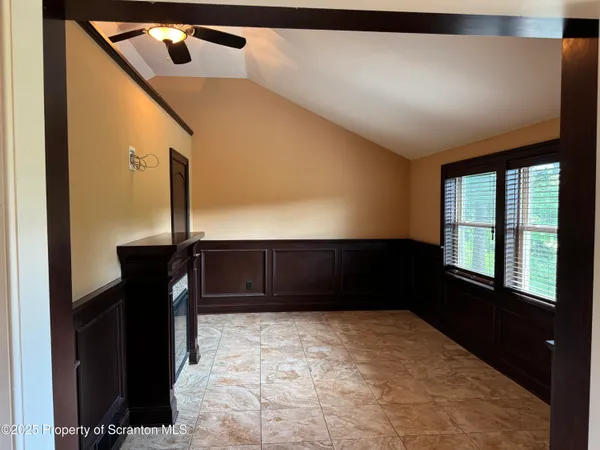 a fireplace with a vase