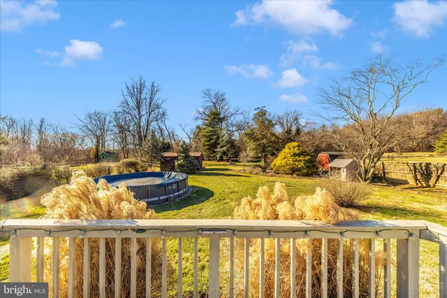 a view of a backyard with a garden