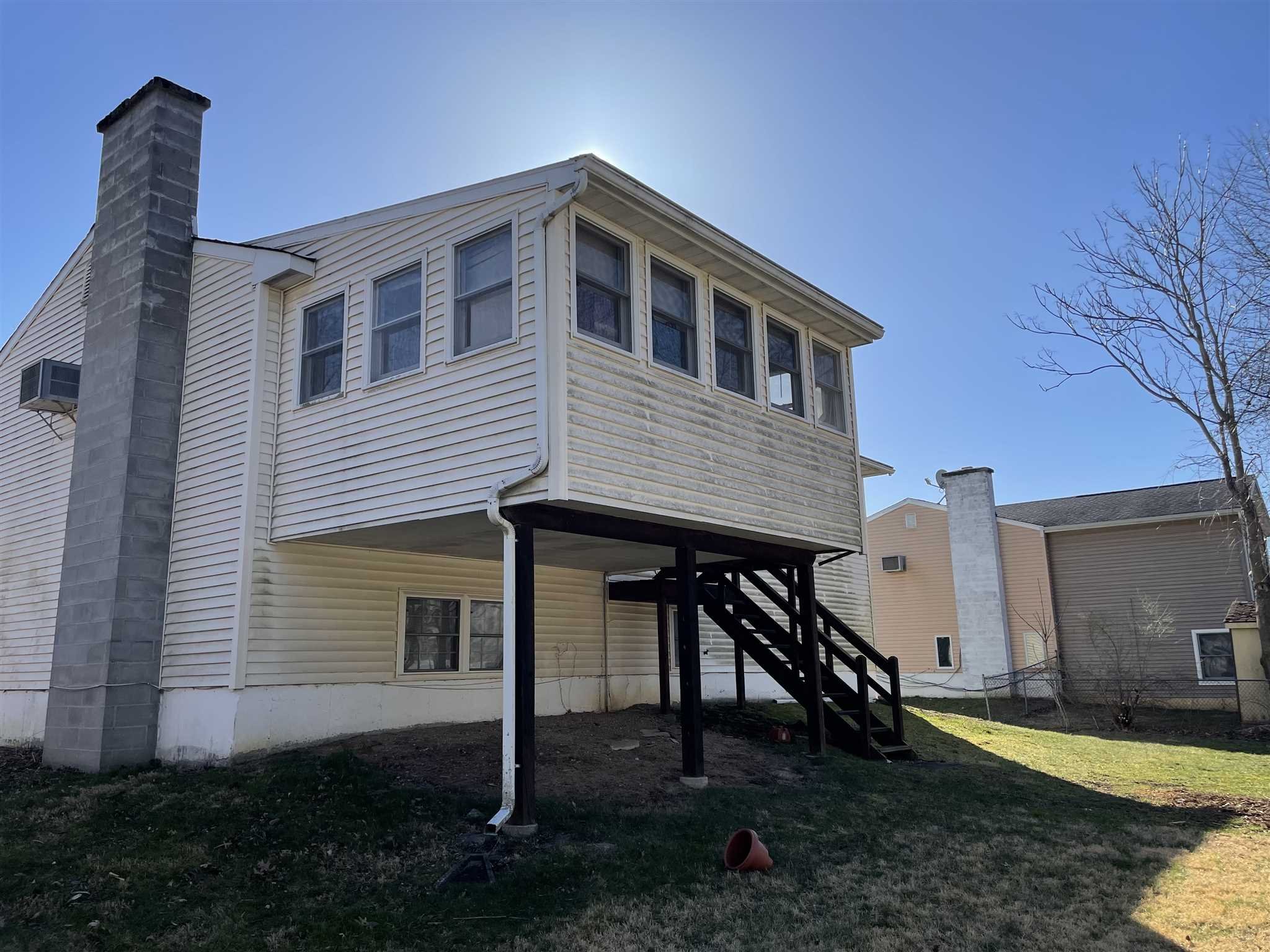 36 Sutton Park Road Poughkeepsie, NY 12603 - Photo 17 of 17 a front view of a house with garden
