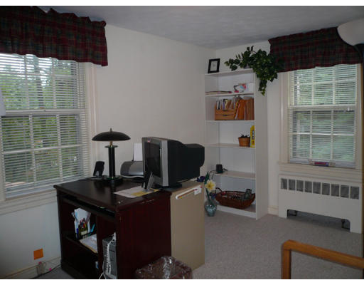 347 Dutton Road Sudbury, MA 01776 - Photo 8 of 16 a view of a workspace with furniture and a window