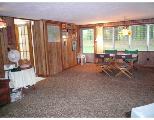 347 Dutton Road Sudbury, MA 01776 - Photo 9 of 16 a living room with furniture and large windows