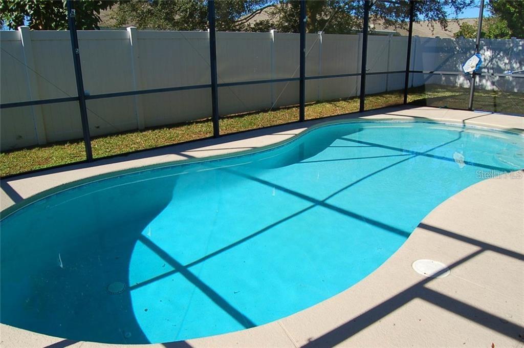 3103 Rawcliffe Road Clermont, FL 34714 - Photo 2 of 17 a view of a tennis court