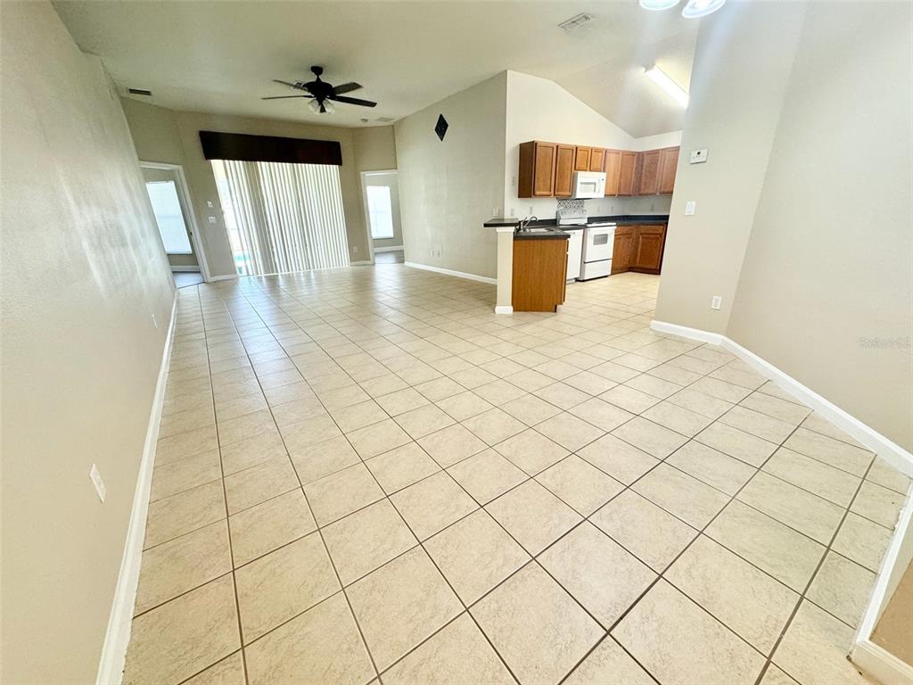 3103 Rawcliffe Road Clermont, FL 34714 - Photo 3 of 17 a view of a kitchen with wooden floor