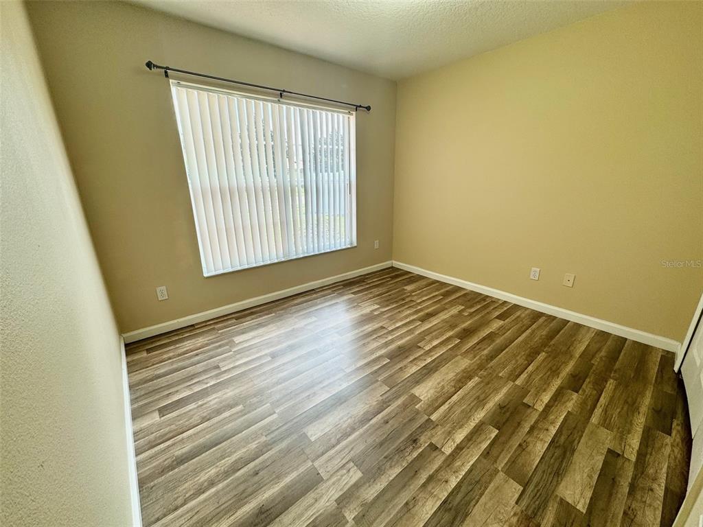 3103 Rawcliffe Road Clermont, FL 34714 - Photo 5 of 17 a view of an empty room and window