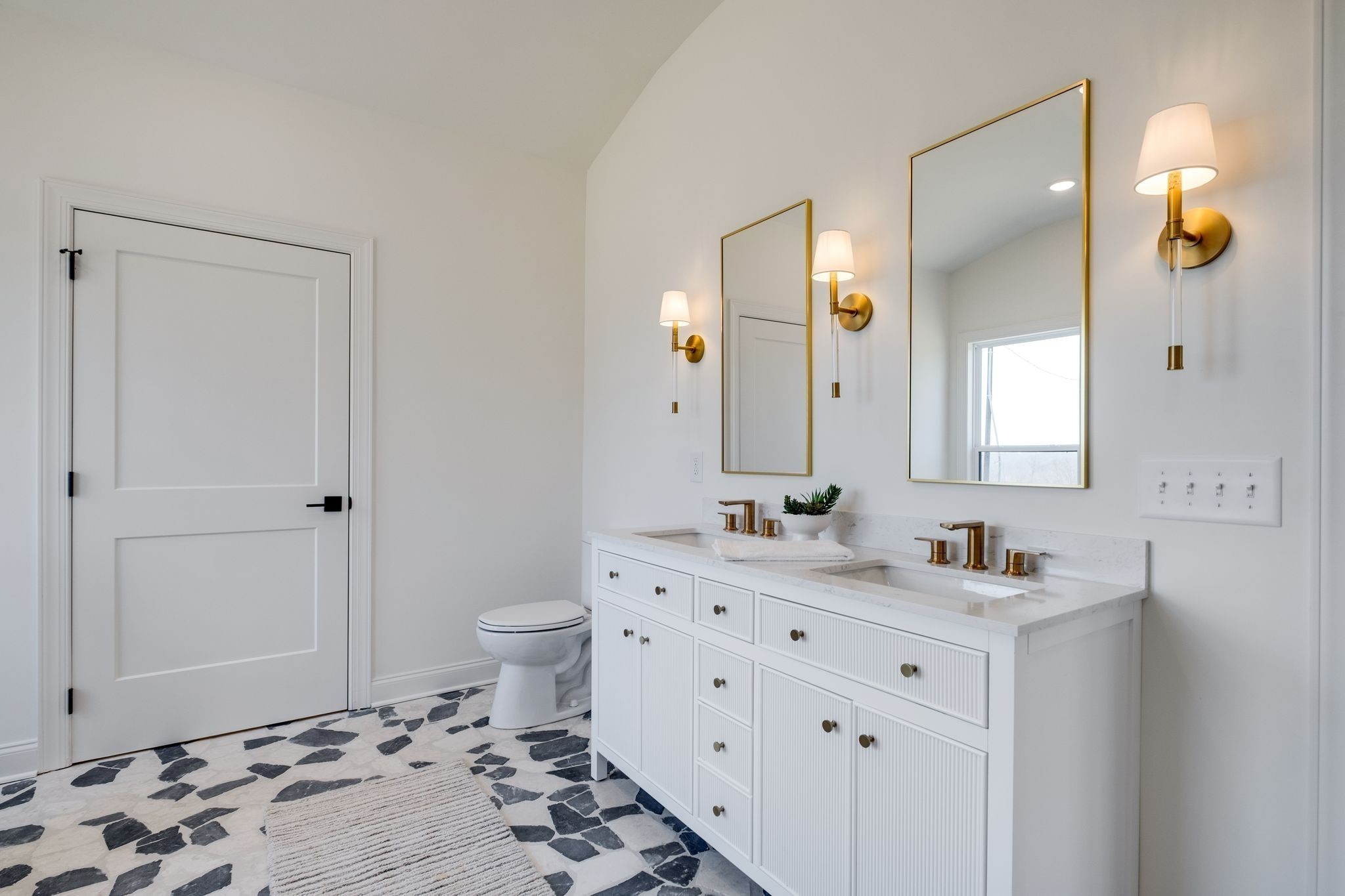 1510 East Piney Road Dickson, TN 37055 - Photo 34 of 66 a bathroom with a sink and a mirror