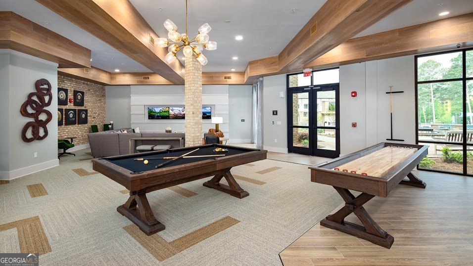 1399 Herrington Road, Unit 1202 Lawrenceville, GA 30044 - Photo 19 of 32 a living room with a piano table and a large window