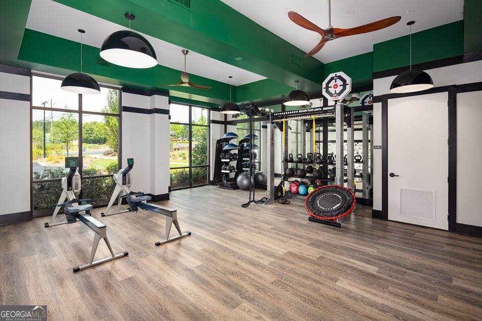 1399 Herrington Road, Unit 1202 Lawrenceville, GA 30044 - Photo 26 of 32 a view of a room with gym equipment