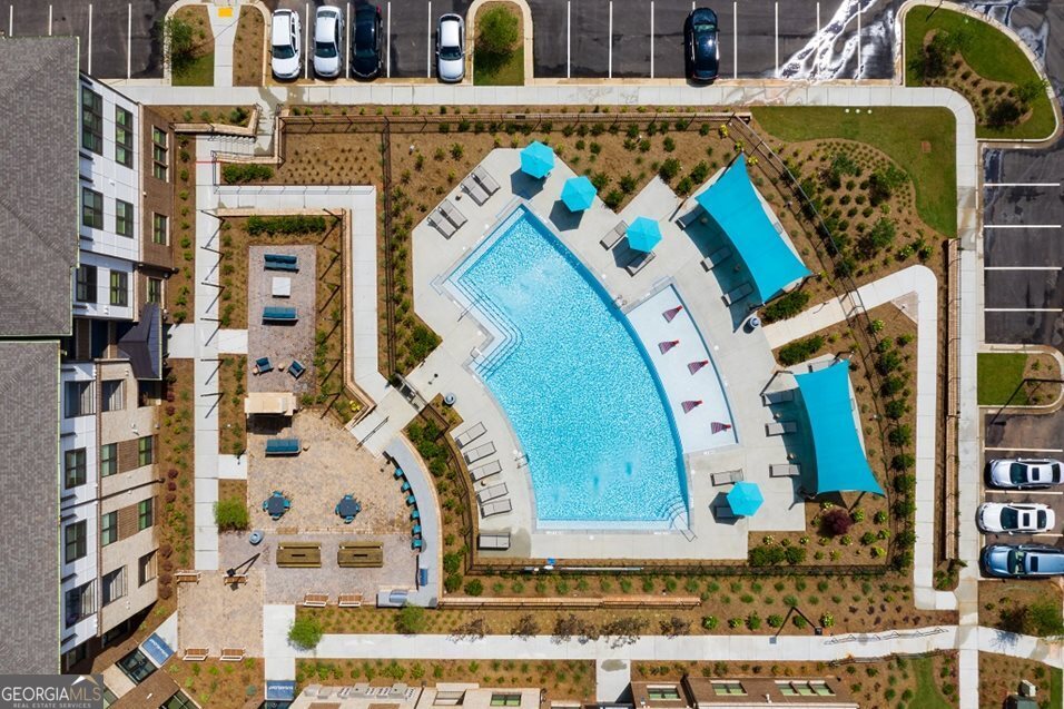 1399 Herrington Road, Unit 1202 Lawrenceville, GA 30044 - Photo 30 of 32 a view of entryway with a small yard