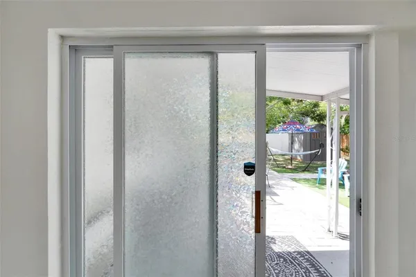 a view of a porch with furniture