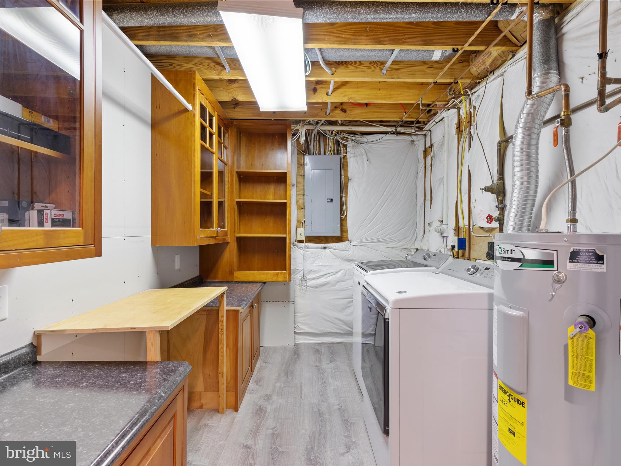 1446 Canterbury Road Front Royal, VA 22630 - Photo 36 of 58 Basement Laundry with Cabinets