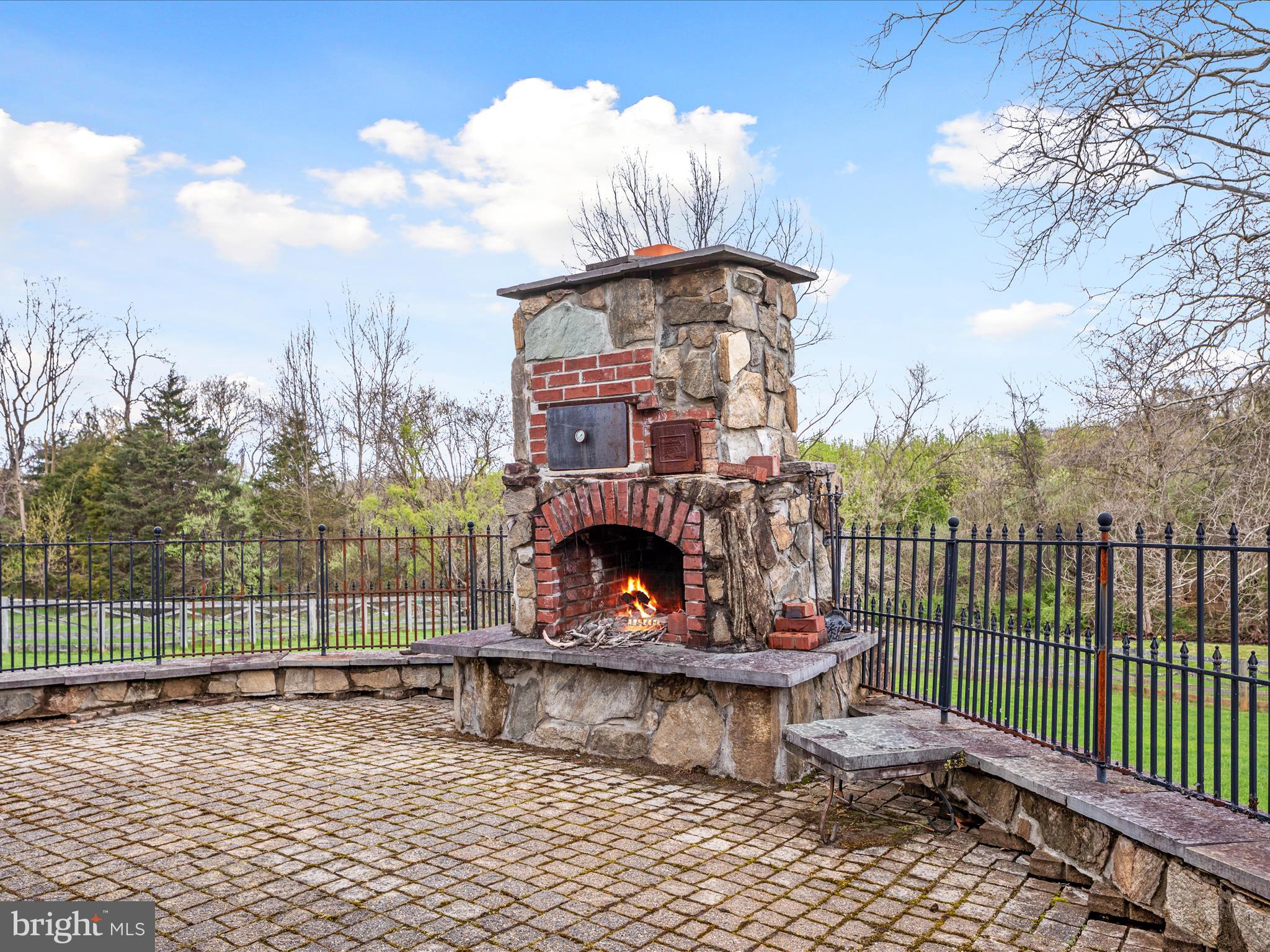1446 Canterbury Road Front Royal, VA 22630 - Photo 41 of 58 Fireplace Rear with Lower Paver Patio
