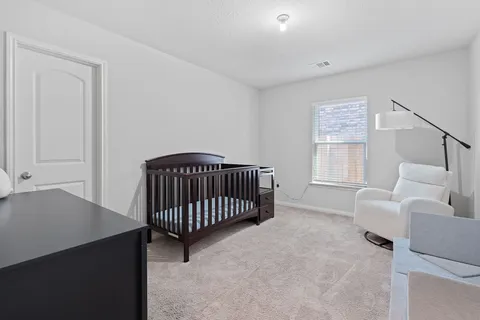 a view of livingroom with furniture and windows