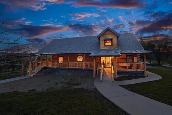 a view of balcony with wooden floor