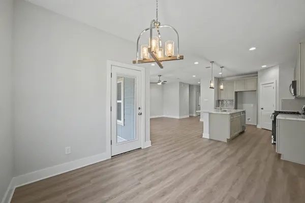 a view of a kitchen and windows